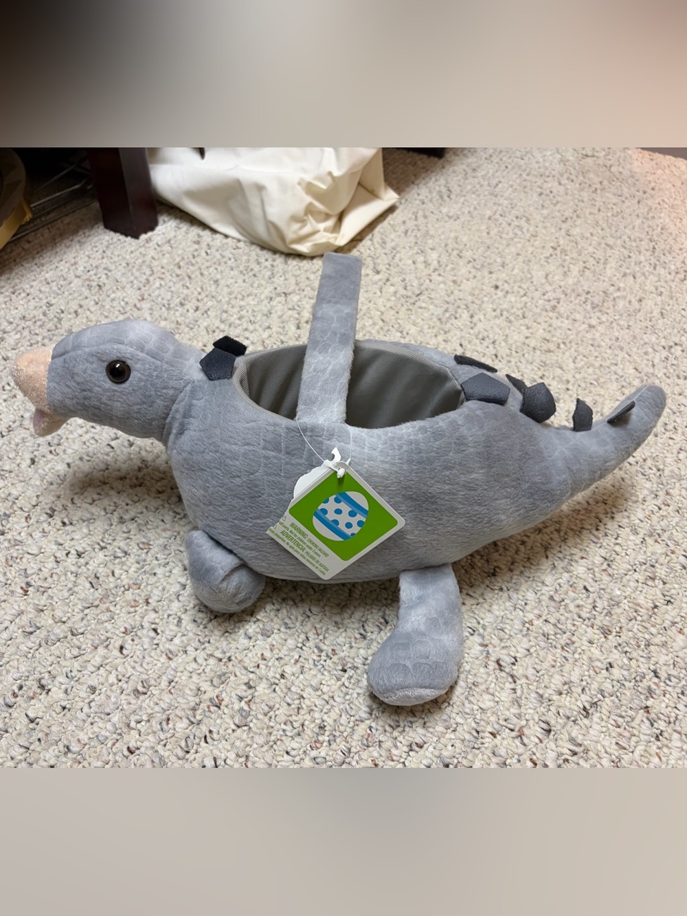 Dinosaur plush basket